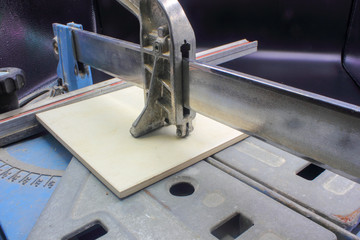 close up of a tile cutting machine