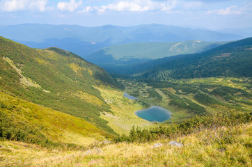 Among the popular tourist destinations of Ukraine tour of the mountain lakes of Chornohora and Svydovets ridge.Beautiful mountain lake Vorozheska on  Svydovets ridge. Ukraine. Carpathians.