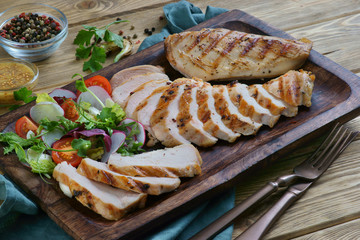 Wall Mural - grilled chicken fillet with vegetable salad