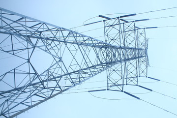 A large electricity pole made of metal