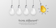 Outstanding gold light bulb on white background, Think different business concept
