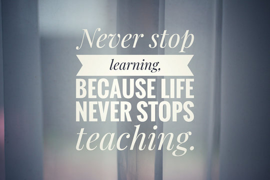 Wall Mural -  - Inspirational quote - Never stop learning. Because life never stops teaching. With white background of home curtain decoration against morning back light. 