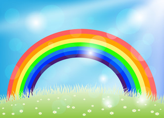 Wall Mural - Bright rainbow in the blue sky and green meadow with flowers.