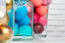 Glass Jar With Bright Colored Eggs For Easter Celebration
