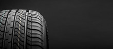 A Black Isolation Rubber Tire, On The Black Backgrounds