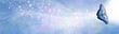 Blue Spiritual Sparkle Butterfly Message Banner - wide gaseous flowing glittering shimmering banner with a beautiful open winged butterfly in right corner moving towards white light and copy space 
