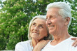 © aletia2011 - Close up portrait of beautiful senior couple hugging in the park