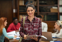 Smiling Student Girl In Library