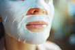 © Alliance - Closeup on young 40 years old woman with facial mask