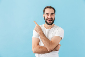 Sticker - Portrait of a young cheerful bearded man wearing t-shirt