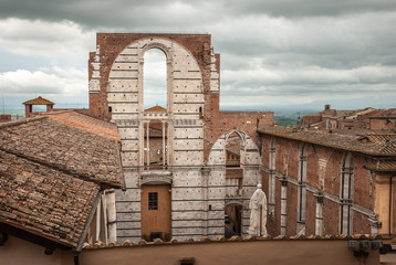 Ancient wall part of the unfinished new Cathedral (Duomo nuovo) with panoramic terrace on the top (Facciatone) Siena,Tuscany, Italy