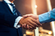 © Charnchai saeheng - Business shaking hands, finishing up meeting. Successful businessmen handshaking after good deal.