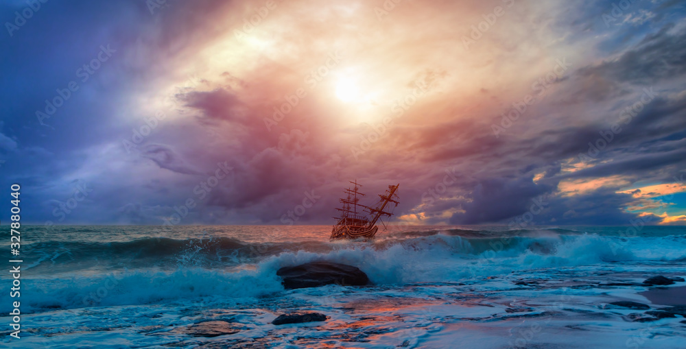 Sailing ship in storm sea against heavy sunset clouds Stock Photo ...
