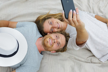 upside down top view photo of two young friends