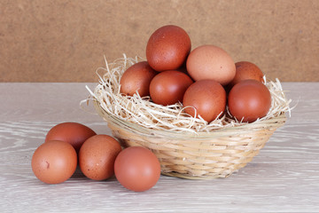 Farm fresh organic eggs on wood surface