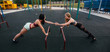 © Andrii - Athletic, sexy girls do push-UPS outdoors. Fitness, healthy lifestyle