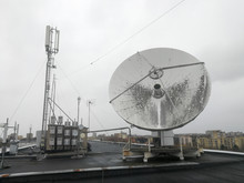 Satellite Parabolic Dish Antenna On The Roof For High Speed Internet Link