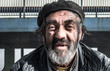 © Srdjan - Close up portrait of old homeless alcoholic man face with white beard and hair wandering on the street depressed sick and lonely, social issues documentary concept