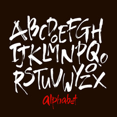 Wall Mural - vector acrylic brush style hand drawn alphabet font. calligraphy alphabet on a black background
