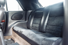 Rear Leather Seats Of A Coupe Convertible Car. Luxury Car Interior.