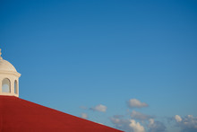 Minimal Portrait Of The Top Of A Church With Blue Sky Background