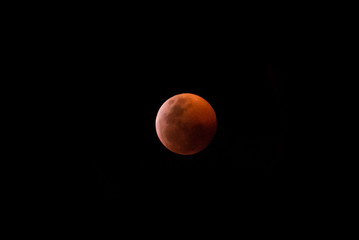 blood moon, red full moon against a black sky