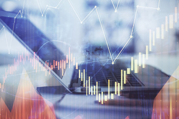 Fototapete - Forex graph hologram on table with computer background. Double exposure. Concept of financial markets.