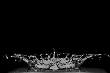 Wall Mural - liquid water droplet collision splash on black background. 3d render