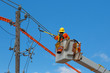 © eskystudio - Contractor at work fixing electric lines