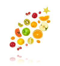 Fresh Fruits Flying In Air. Papaya, Apple, Orange, Kiwi, Melon, Citrus Isolated On White. Fruity Vegan Tropical Mix Background. Colorful Levitation, Falling Fly Fruit Creative Concept