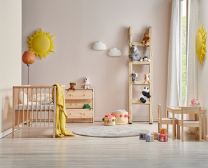 Modern baby room concept cradle bed and wooden cabinet, toys and table style.