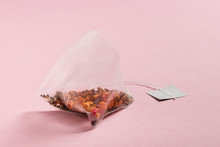 Triangle Infusion Tea Bag On Pink Background