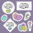 © JuliPaper - Set of easter stickers hand-drawn. Lettering of the phrase 'Happy Easter' in German language, flowers, painted eggs. The vector illustration for printing and design posters and web applications.