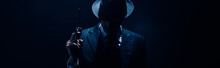 Silhouette Of Gangster Raising Gun On Dark Blue Background, Panoramic Shot