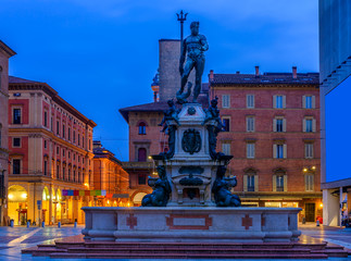 Wall Mural - Piazza del Nettuno and Fountain of Neptune in Bologna, Emilia-Romagna, Italy. Architecture and landmark of Bologna. Night cityscape of Bologna.