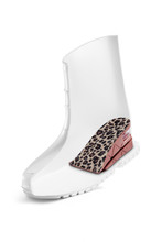 Subject Shot Of A White Boot Cut In Half And With A Half-insole With Leopard Pattern. The Height Increasing Insole Consists Of Two Parts. The Showpiece Is Isolated On A White Background. 