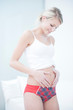 Portrait of a beautiful young pregnant woman