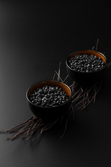 Bean dark bowls on a dark background