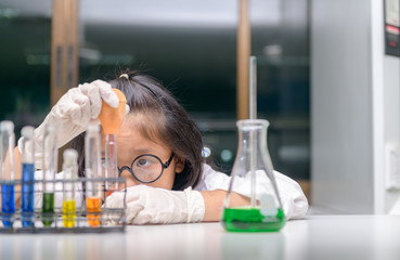 Wall Mural - little scientist use dropper to making experiment