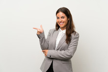 Young Business Woman Over Isolated White Background Pointing Finger To The Side