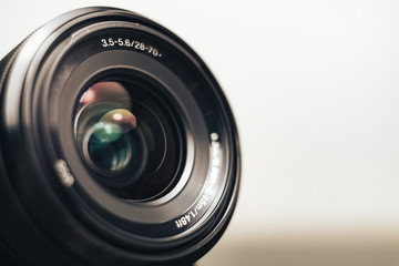 Aufkleber - Close up beautiful camera lens on a gray background.