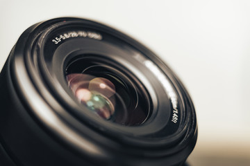 Aufkleber - Close up beautiful camera lens on a gray background.