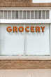© Kristen Curette Photography LLC/Stocksy - Grocery store signage in Marfa, Texas