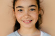 © Nabi Tang/Stocksy - Freckle girl