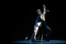Couple Of Dancers Performing On Isolated Black Background