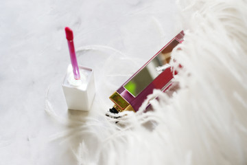 Poster - Colorful lipstick with applicator near it.Cosmetics concept.