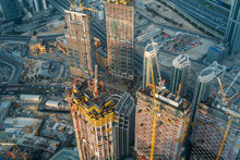 Modern Construction Sites Of High Rise Building In Dubai, View From Above.