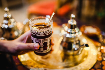 traditional Arabic tea cup, arab people drinking tea in Ramadan