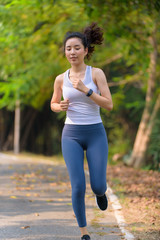 Young woman running in a park