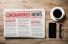 Mockup Of Coronavirus Newspaper, News Related Of The COVID-19 With The The Headline In Paper Media Press Production Concept On Wooden Table